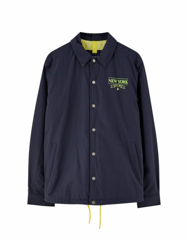 Navy blue coach jacket with neon detail